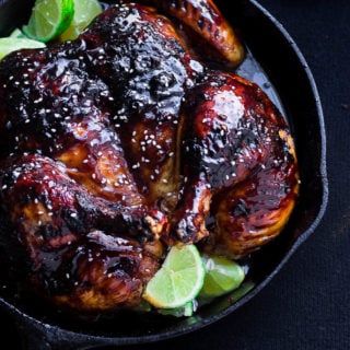 Delicious sticky pomegranate glazed roasted whole chicken. The pomegranate glaze can be used on chicken wings, chicken thighs, baked chicken breast and more!
