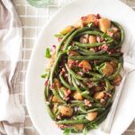 Fresh green beans cooked in a skillet with onions, potatoes and bacon.  So delicious, yet so simple to make. Perfect as a Thanksgiving side dish.