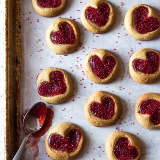 PEANUT BUTTER AND JELLY HEART SHAPED THUMBPRINT COOKIES