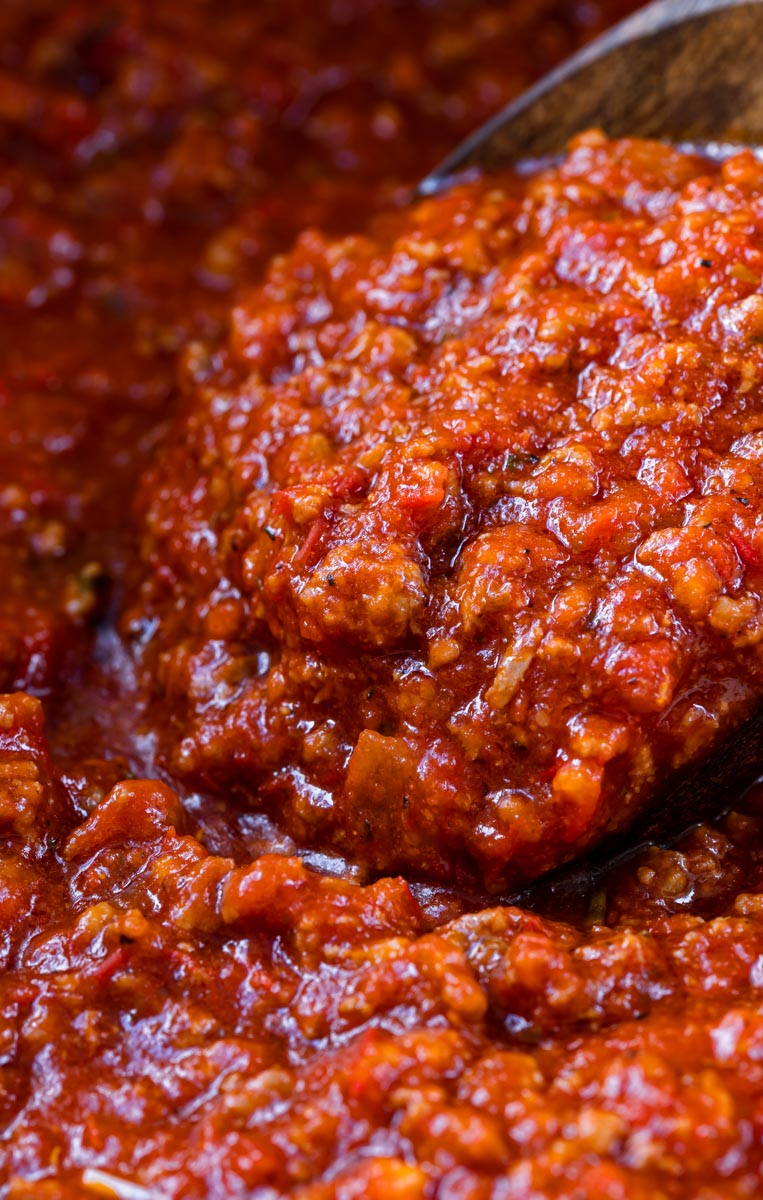 A closeup picture of meat sauce in a pot